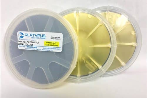 three silicon wafers coated with gold